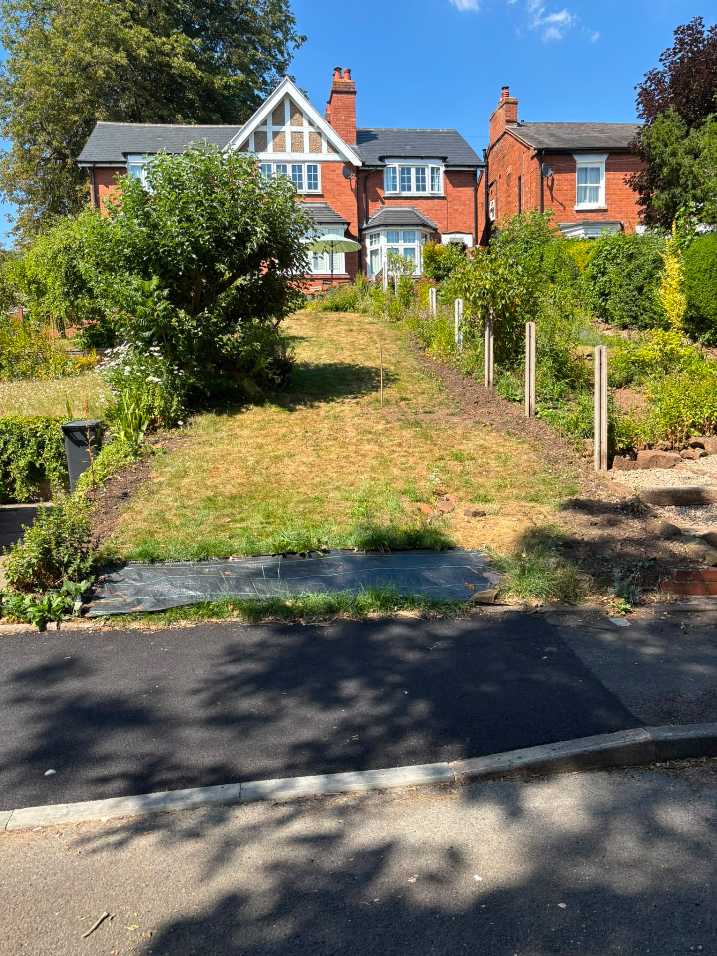 Sloped Garden to Driveway & Retaining Wall before work started